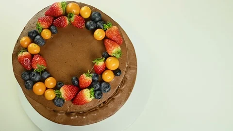 Chocolate cake with fruit spins Stock Footage 120401825