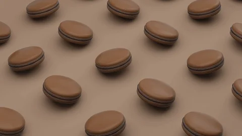 Chocolate cake macaron or macaroon on brown background. Stock-Footage 99981373