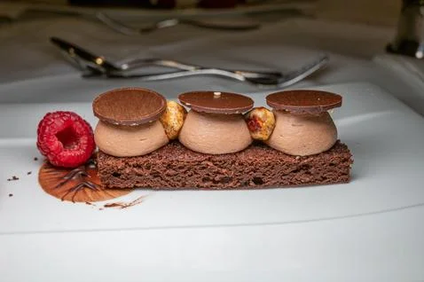 Chocolate cake with raspberry, hazelnut. Delicious dessert. Stock Photos