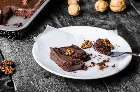 Chocolate cake with roasted nuts Stock Photos
