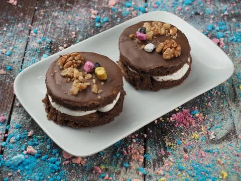Chocolate cake sprinkled with nuts Stock Photos