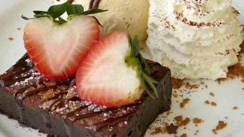 Chocolate cake with strawberry on top Stock Footage 77568172