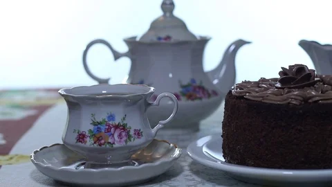 Chocolate Cake with Tea Stock Footage 73511225