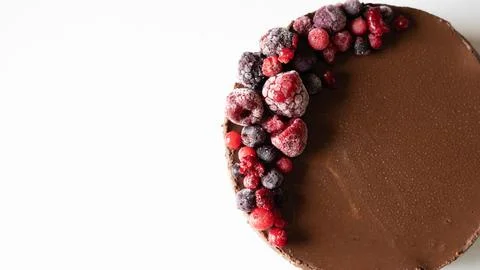 Chocolate cake on a white background with copyspace Stock Photos