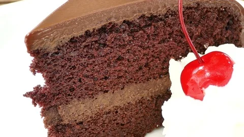 Chocolate cake in white plate Stock Footage 82620574