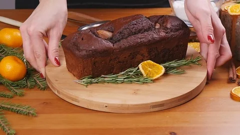 Chocolate cake on a wooden table Stock Footage 74390857