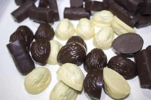 Chocolate candies of different shapes Stock Photos