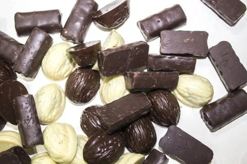 Chocolate candies of different shapes Stock Photos