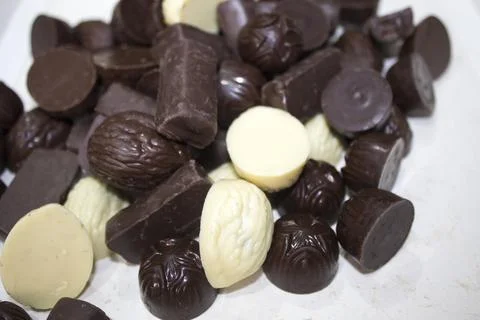 Chocolate candies of different shapes Stock Photos