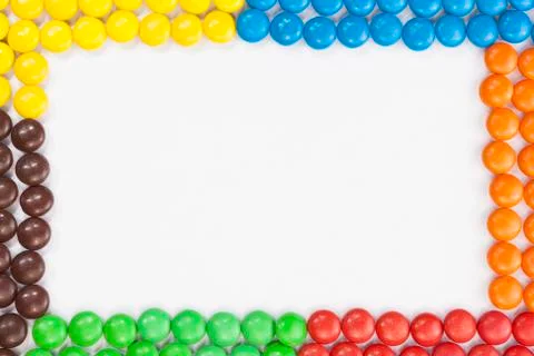 Chocolate candies frame Stock Photos
