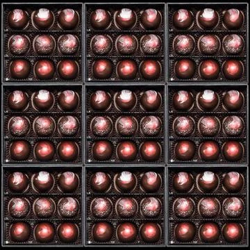 Chocolate candies in giftboxes. Assorted chocolates confectionery in their gi Stock Photos