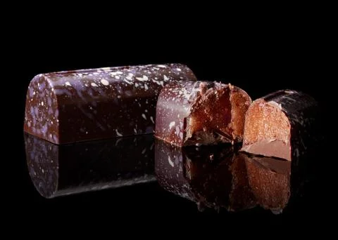 Chocolate candy on black background Stock-Fotos