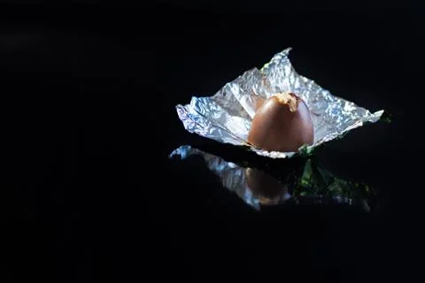 Chocolate Candy on black background. Stock Photos