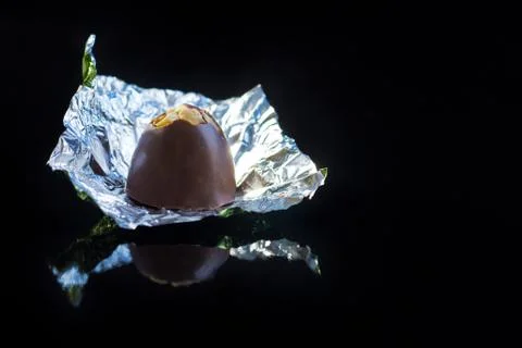 Chocolate Candy on black background. Stock Photos