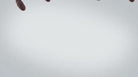 Chocolate candy falling and piling up, filling up half the screen. Stock Footage 57814688