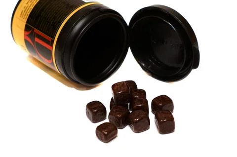 Chocolate candy in the form of cubes Stock Photos