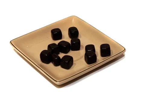 Chocolate candy in the form of cubes Stock Photos
