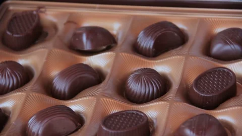 Chocolate candy hand Stock Footage 80537273