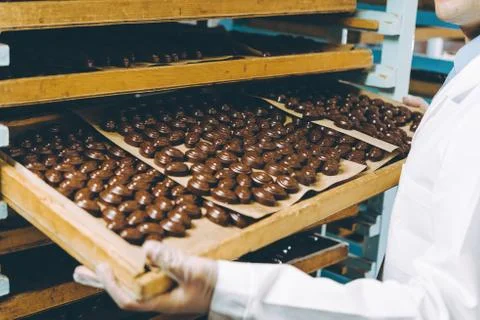 Chocolate candy making Stock Photos
