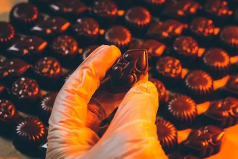 Chocolate candy making Stock Photos
