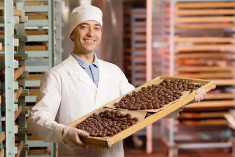 Chocolate candy making Stock Photos
