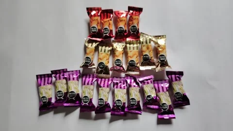 Chocolate Candy Mix Flat Lay Assorted Wrapped Chocolates Stock Footage 329095138