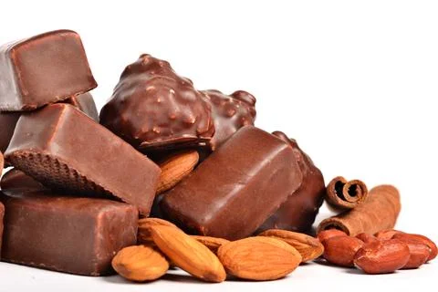 Chocolate candy with peanuts and almonds Фото