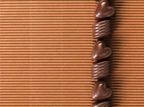 Chocolate candy in the shape of heart Stock Photos
