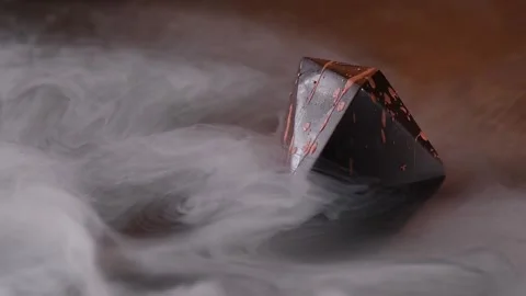 Chocolate candy in a smoke. Stock Footage 132043974