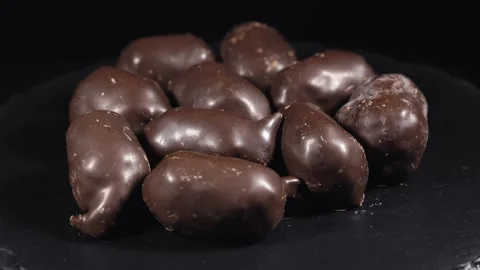 Chocolate candy on stone plate. Stock Footage 320466796