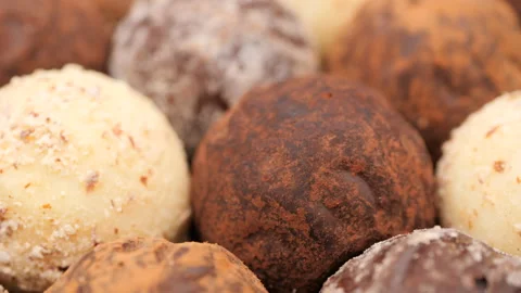 Chocolate candy truffles close up, slider shot Video stock 224469751