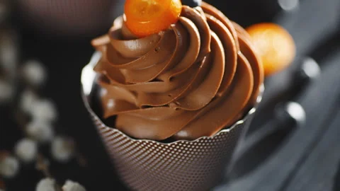 Chocolate capcake on a dark background Stock Footage 89917707