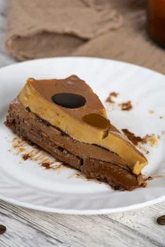Chocolate Caramel Flan Slice on Rustic Plate Stock Photos