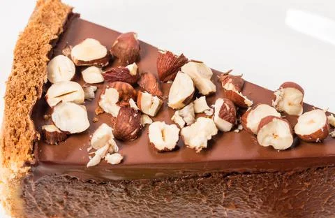 Chocolate cheesecake with hazelnuts. Stock Photos