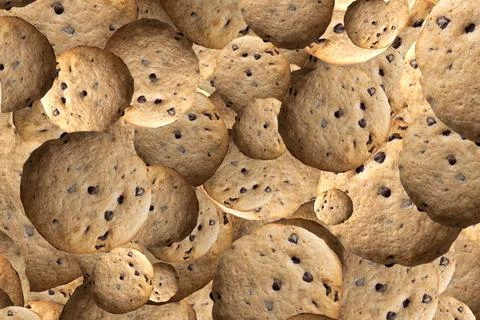 Chocolate chip biscuit pattern.Cookie texture background. Stock Photos