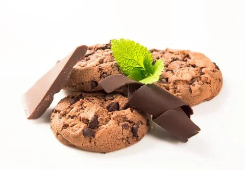 Chocolate chip cookie with mint leaf and chocolate Stock Photos