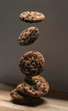 Chocolate Chip Cookie Tower With Falling Cookies Photos