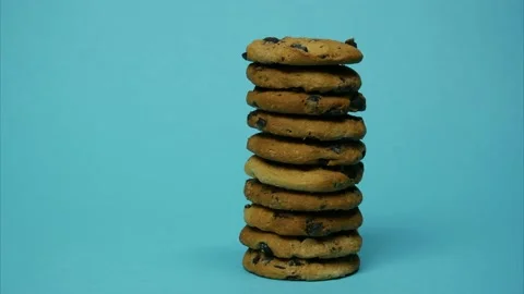 The chocolate chip cookie tower grows and decreases. Stop motion Stock Footage 146990609