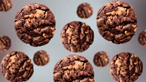 Chocolate Chip Cookies of different diameters on a gradient color background Stock Footage 166412424