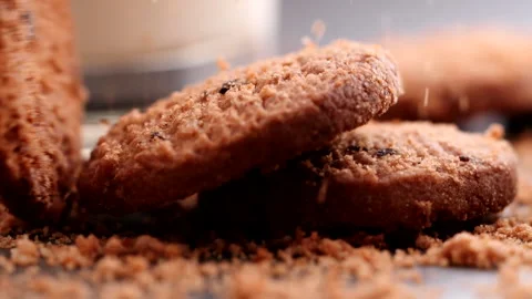 Chocolate chip cookies falling, dropping into table, slow motion Stock Footage 226194513