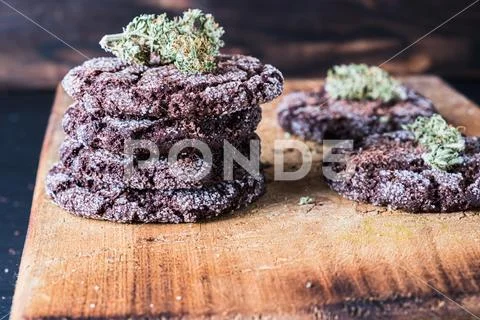 Chocolate chip cookies with marijuana, sprinkled with chocolate chips and can Stock Photos