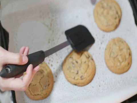 Chocolate chip cookies on a pan Stock Footage 80739180