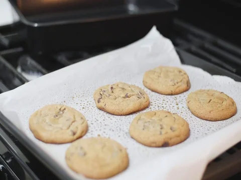 Chocolate chip cookies on a pan Stock Footage 80739315