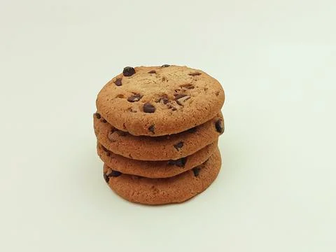 Chocolate chip cookies stack isolated on light background with copy space Stock Photos