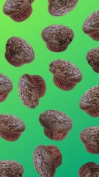 Chocolate chip muffins creating a vibrant green background pattern Stockfoto's