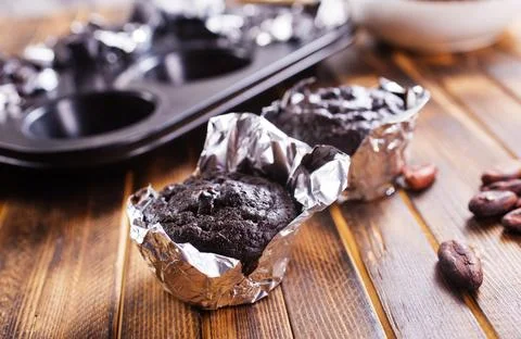 Chocolate chip muffins mini size on a board, double chocolate muffins, Stock Photos