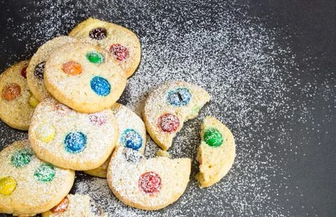 Chocolate chips and multicolored candy homemade shortbread cookies Stock Photos
