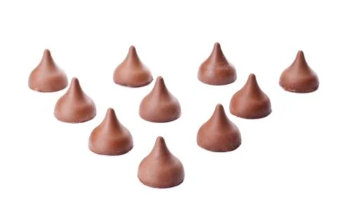 Chocolate chips arranged in triangle Stock Photos