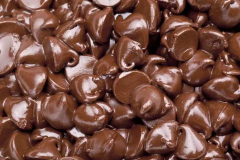 Chocolate chips background Stock Photos
