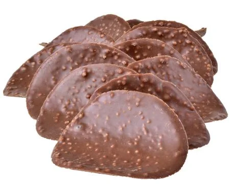 Chocolate chips close up isolated Stock Photos